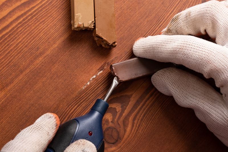 Professional flooring repair in action
